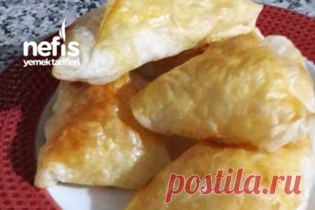 Üçgen Böreğim Puf Puff - Nefis Yemek Tarifleri Üçgen Böreğim Puf Puff Tarifi nasıl yapılır? 165 kişinin defterindeki bu tarifin detaylı anlatımı ve deneyenlerin fotoğrafları burada.