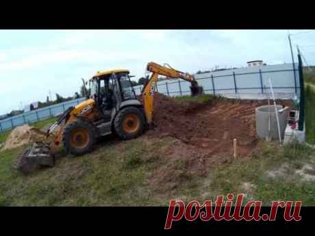 Выемка грунта под фундамент гаража экскаватором JCB
