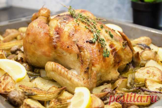 Курица, запеченная в духовке целиком с ароматным чесночным маслом