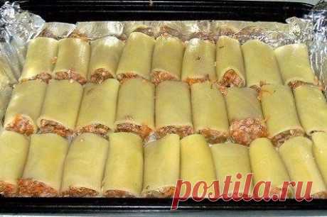 Фаршированные каннеллони, запеченные с сыром