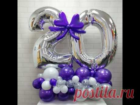 Цифры из воздушных шаров на красивом основании Figures of balloons on a beautiful base
