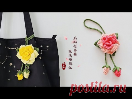 一朵玫瑰和两个花苞的缠绕