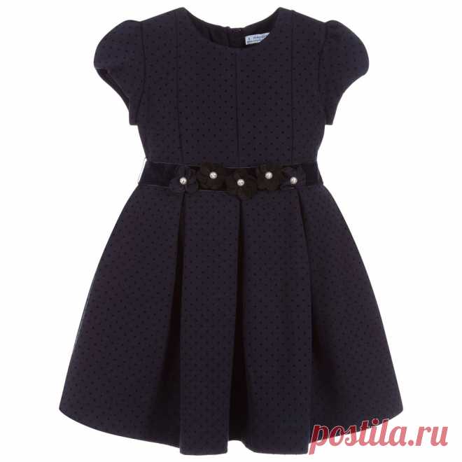 Girls Navy Blue Cotton Dress Girls navy blue dress from Mayoral, with a raised black dot pattern. It is made in soft, mid-weight cotton jersey and has lovely puffed sleeves. There is a removable velvet ribbon belt, with fabric flowers and pearl beads. 
