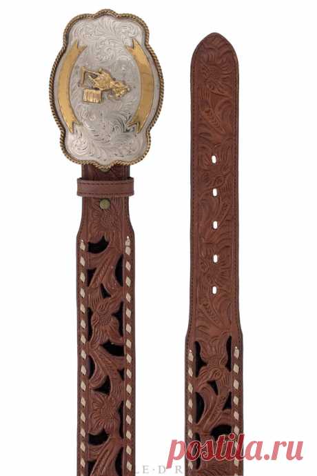 Belt, A Vintage, Buckle, Trophy, Western, Tooled Leather with Velvet Underlay, Vintage ‘90s, 222 BUCKLE UP, COWGIRL! This ‘90s-era vintage find is from DDR’s early belt offerings. The trophy-style buckle is scrolled silver framed with twist wire detail and features fun embellishments of contrasting brass banners and a horseback barrel racer. 
$265