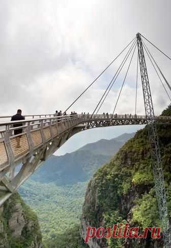 Langkawi Sky Bridge is a 125 metres (410 ft) curved pedestrian cable-stayed bridge in Malaysia. It is located 700 metres (2,300 ft) above sea level at the peak of Gunung Mat Chinchang on Pulau Langkawi, an island in the Langkawi archipelago in Kedah.  |   Pinterest: инструмент для поиска и хранения интересных идей