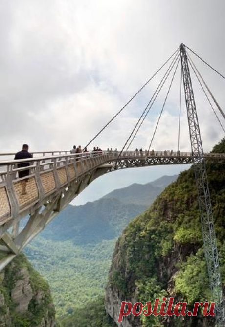 Langkawi Sky Bridge is a 125 metres (410 ft) curved pedestrian cable-stayed bridge in Malaysia. It is located 700 metres (2,300 ft) above sea level at the peak of Gunung Mat Chinchang on Pulau Langkawi, an island in the Langkawi archipelago in Kedah.  |   Pinterest: инструмент для поиска и хранения интересных идей