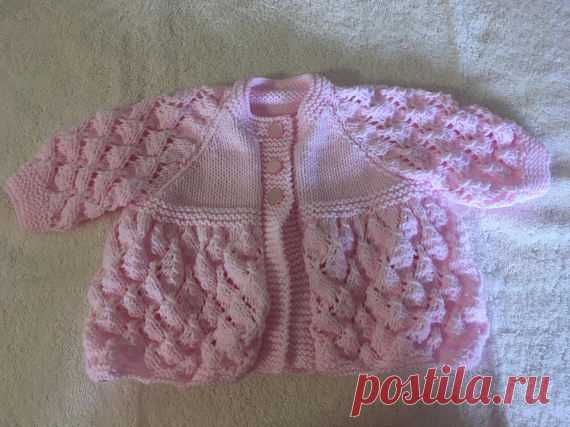 Handknitted baby cardigan Handknitted using Sirdar wool. Age 0-3 months. Machine washable.