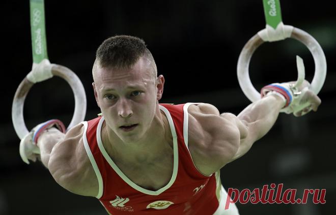 Денис Аблязин. © AP Photo/Julio Cortez. РИО-ДЕ-ЖАНЕЙРО, 15 августа. /ТАСС/. Российский гимнаст Денис Аблязин завоевал бронзовую медаль Олимпийских игр в Рио-де-Жанейро в упражнении на кольцах. Подробнее на ТАСС: http://tass.ru/sport/3540631  |  ТАСС: Спорт - Гимнаст Денис Аблязин завоевал бронзу Олимпийских игр в упражнении на кольцах