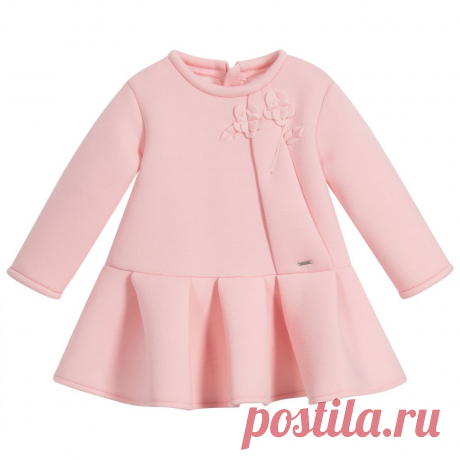 Girls Pink Neoprene Dress In a lovely shade of pale pink, a soft neoprene dress for little girls by Mayoral. This long-sleeved, viscose blend dress has pretty floral appliqué on the front, a branded metal plaque and a gently pleated skirt. 
