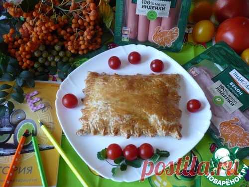 Конвертики из слоеного теста с сосисками – кулинарный рецепт