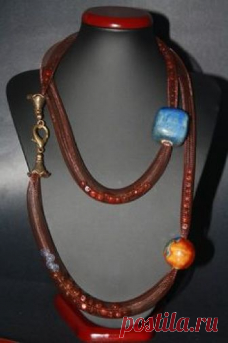 Beautiful 2013 New tubular beaded necklace made with the finest Italian mesh filled with elegant crystal beads & 2 large rich gemstones. $85.00, via Etsy.