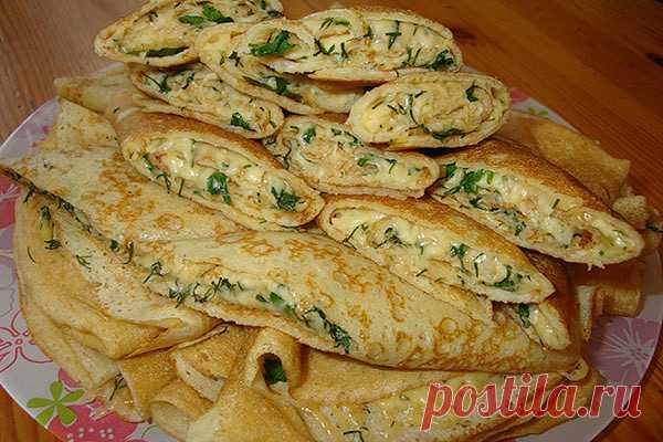 Конвертики из блинов с сыром и зеленью
Блинчики с сыром и зеленью — это универсальное блюдо! 
Оно может быть легким завтраком и ужином 
и дополнением к обеденному чаепитию. 
Попробуйте, очень вкусно. 
Пошаговый рецепт приготовления >>>
http://super-recept.my1garden.ru/konvertiki-iz-blinov-s-syrom-i-zelenyu/