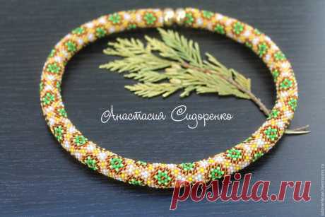 Жгут из японского бисера Toho Марокканская мозаика Купить или заказать Жгут из японского бисера Toho Марокканская мозаика в интернет-магазине на Ярмарке Мастеров. Жгут выполнен из элитного японского бисера Тохо. Жгут из японского бисера модной яркой расцветки будет вашим неповторимым аксессуаром который привлечет внимание и уж точно не оставит Вас незамеченной. Жгут очень красиво мерцает и переливается. Фурнитура золотого цвета. Магнитная застежка Длина 48 см. Фурнитура по...