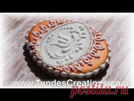Easter egg cookie with flowers and lace decorated with royal icing by gingerbread artist Tunde Dugantsi. For more information about these cookies and to see ...