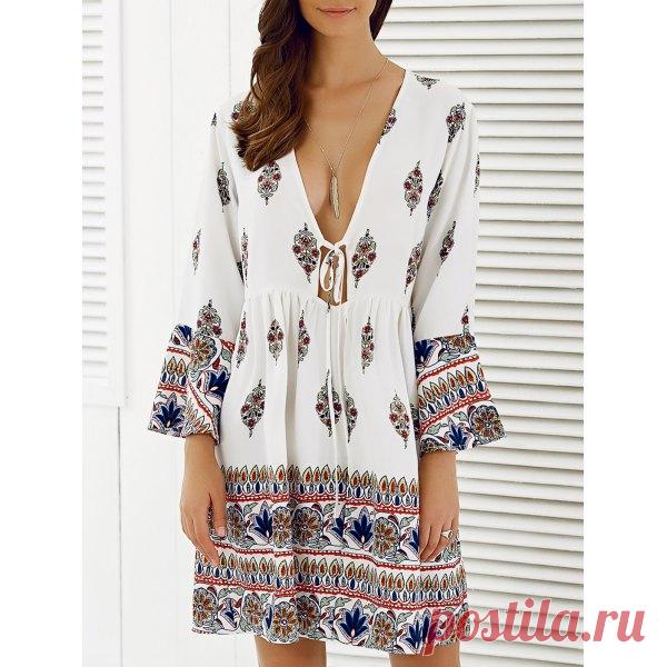 Plunging Neck Floral Loose Dress I like this. Do you think I should buy it?