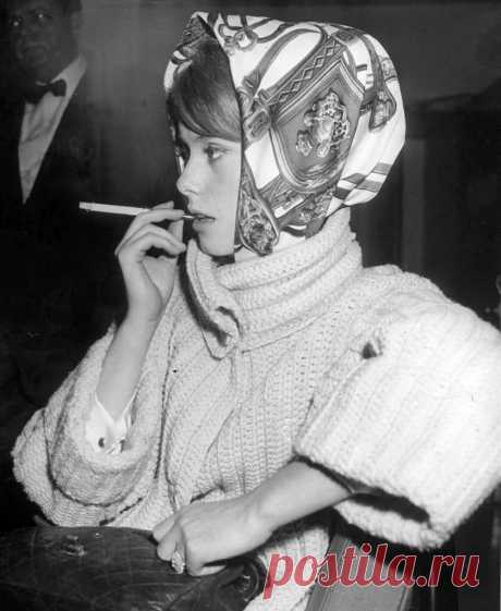 Catherine Deneuve (wearing Hermès scarf) waiting at JFK airport, 1961