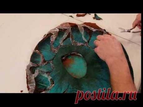 Hand felted vessel with cutaway resist - YouTube
