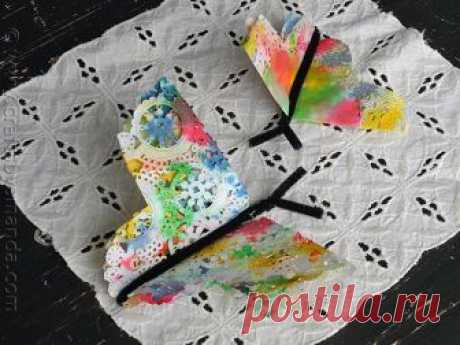 BUTTERFLY CRAFT: PAPER DOILY BUTTERFLIES. Paper Doily Butterflies: a fun butterfly craft perfect for spring! Butterfly crafts are fun for kids and a great way to celebrate spring! These colorful paper doily butterflies are made from food coloring and paper doilies!