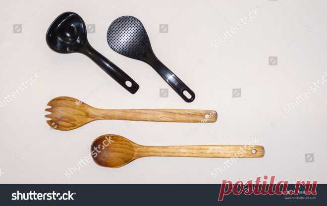 Стоковая фотография «Wooden Plastic Cutlery Isolated On White» (редактировать), 1584880939