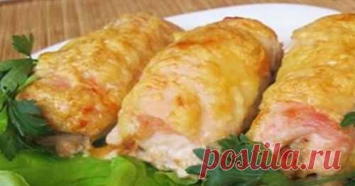 Рецепт изысканных куриных рулетиков с шампиньонами в сливочном соусе