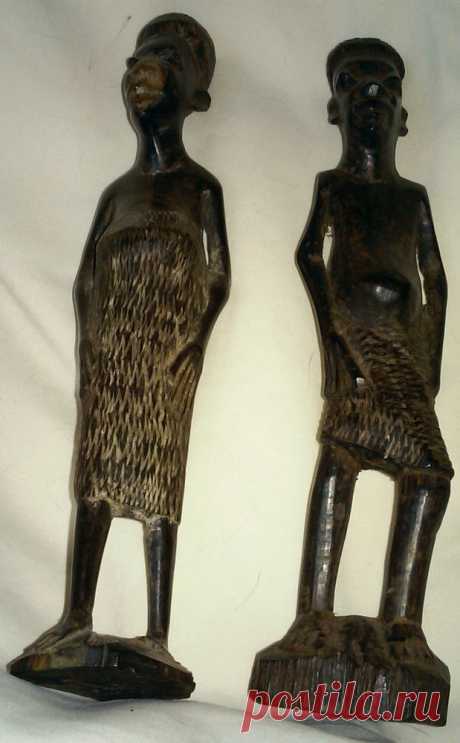 Tribal Hand Carved Wood Man And Woman Figurine Sculptures Set   | eBay These are two hand carved statues of a African man and a African woman. Each statue is 8" tall and 2" wide. | eBay!