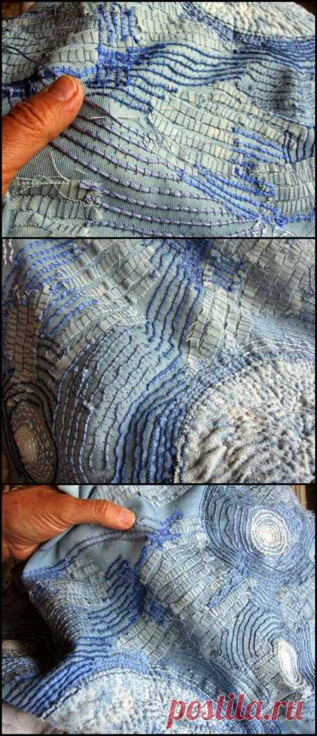 "The threads and fabrics are familiar things used in an unfamiliar way. What is usually used to make a neat seam or a mended pocket, is used here in a messy and raveled manner."