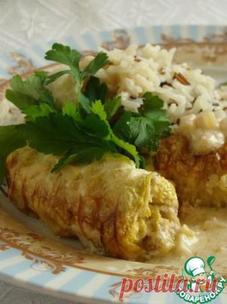 Рыбные голубцы из пекинской капусты с соусом из кальмаров - кулинарный рецепт