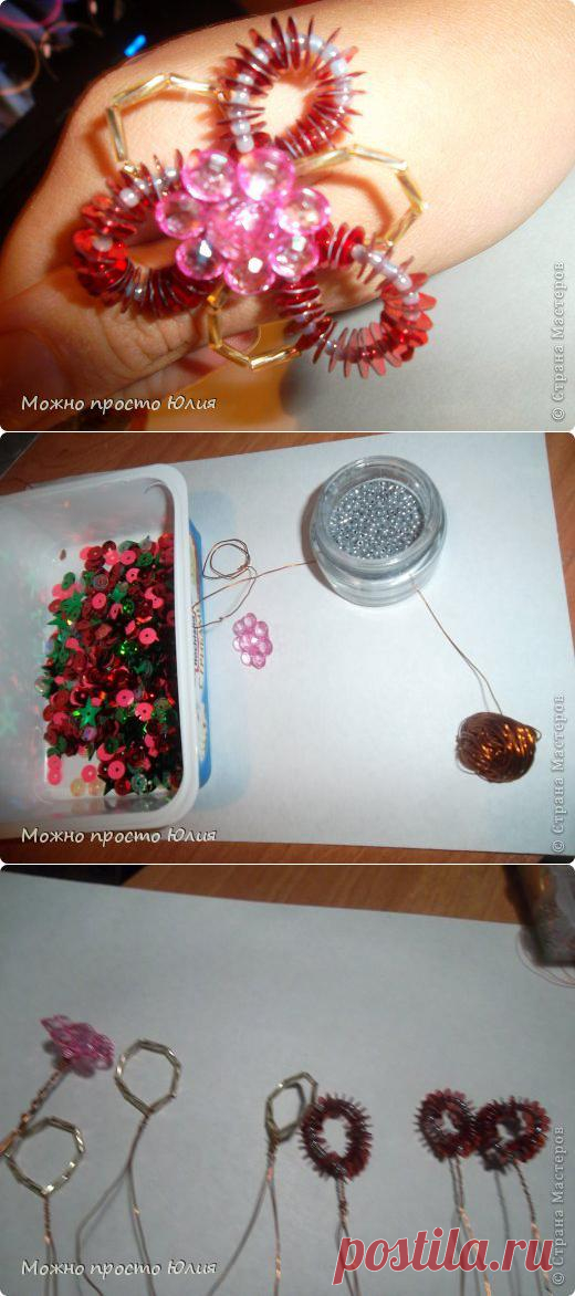 Необычный цветочек. Весьма симпатичный. Использовать его можно по вкусу в колечко, серёжки, заколки и так далее.