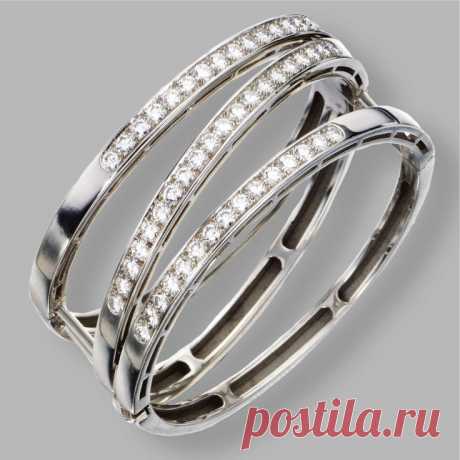 18 KARAT WHITE GOLD AND DIAMOND BANGLE-BRACELET, VAN CLEEF &amp; ARPELS