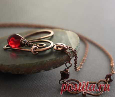 Heart copper necklace with red Czech glass teardrop on chain with a beaded decorative hook clasp - Romance necklace - Heart pendant - NK020 This artisan heart copper necklace made with swirly heart pendant hand forged with 14 gauge solid copper wire and embellished with red color of Czech glass teardrop dangle. Then its finished up with antique finish copper chain and beaded decorative swan shape hook clasp. ATTENTION - ORDERS TO US: Shipping to US uses USPS First Class sh...