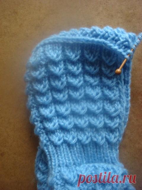 Вязаный комбинезон для новорожденного