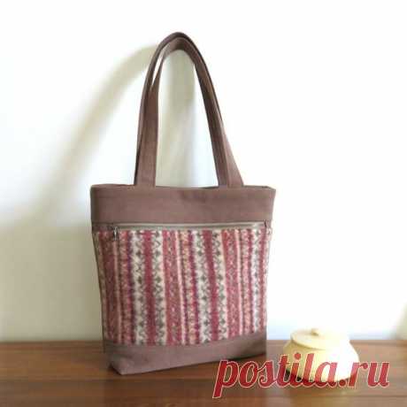MADISON Tote in Repurposed Sweater Wool and Canvas, Eco Friendly, Upcycled Tote Bag This unique MADISON tote bag will be a great addition to your handbag collection! This MADISON tote is made from repurposed canvas and sweater wool. The felted sweater wool is a pretty pattern in copper, tan and brown. The heavy duty canvas is repurposed from a pair of work pants. The front of the