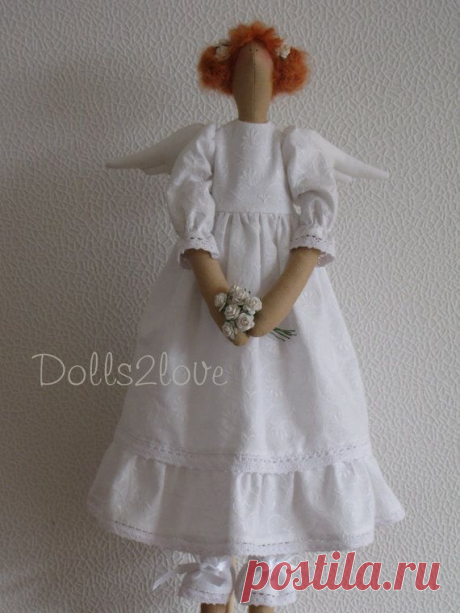 Tilda angel Maya wearing a white dress made from от Dolls2love