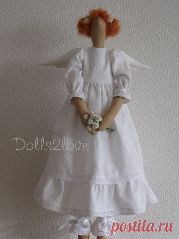 Tilda angel Maya wearing a white dress made from от Dolls2love