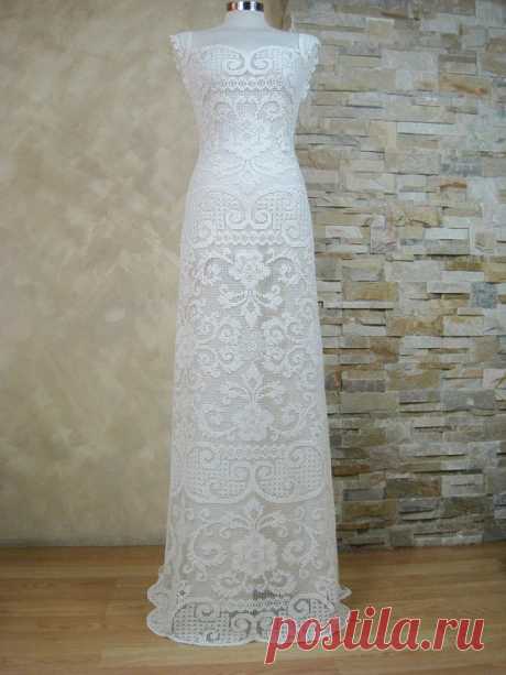 Exclusive ivory lace wedding dress, bridal dress made from vintage knotted filet lace, boho wedding dress, beach lace wedding dress Wedding dress made from vintage the handmade knotted filet lace. The lace from soft breathable cotton make this dress elegant and comfortable to wear. Designed and crafted by Lecrochet Art. The finished product in a single copy.  Bust 36 - 42 Waist 28 - 32 Hip 37 - 42  The length is