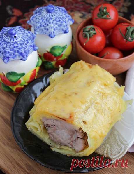 Мясо свинины запеченное в картофеле с сырной корочкой