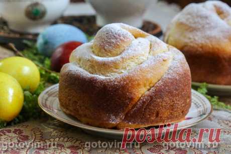 Заварной пасхальный кулич по старинному рецепту. Рецепт с фото Это кулич выглядит необычно и по форме напоминает цветочный бутон. Мякиш кулича пористая, воздушная и очень ароматная, что и ожидаемо от хорошей сдобы. По желанию, кроме замоченного в алкоголе изюма, в тесто можно примешать цукаты. Для украшения достаточно сахарной пудры.