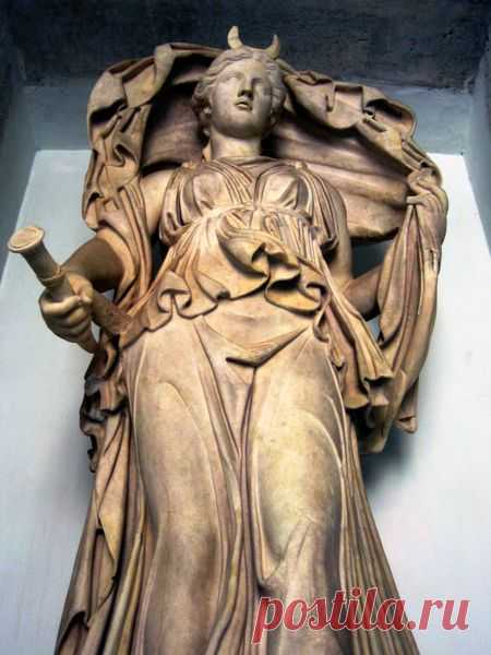 Selene - goddess of the Moon, with her cloak billowing above her head.