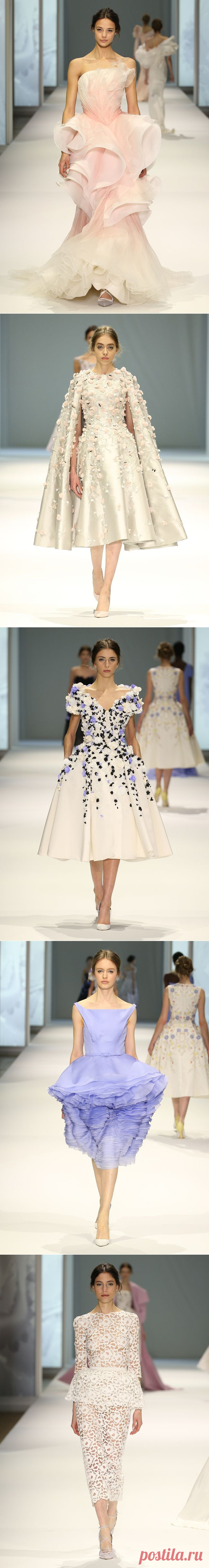 Обзор коллекции Ralph & Russo Couture весна-лето 2015. Британский бренд Ralph & Russo продолжает пропагандировать традиционный подход к созданию кутюрных образов. Его создательница Тамара Руссо - одна из немногих официально признанных женщин-кутюрье и при создании своих нарядов она пытается не нарушать естественных пропорций.