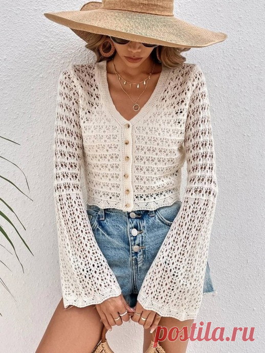 Укороченный жакет спицами с оригинальными рукавами