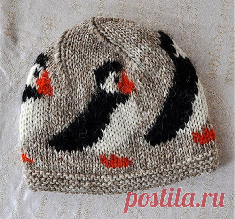 Beige handknitted unisex puffin, woolen hat/ cap made out of 100% pur…