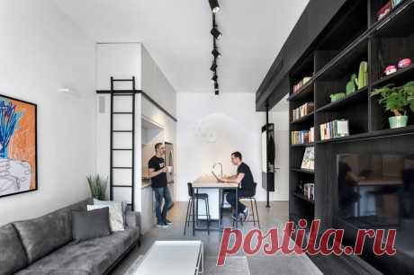 Квартира 44 м² для двух карьеристов Небольшая квартира площадью 44 м² в центре Тель-Авива с высокими потолками и несколькими интересными решениями. Чтобы избежать перегородок, мебель расположили возле стен, создав зоны отдыха и кухню в ...