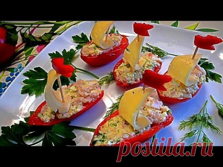 Закуска из помидор, сыра и ветчины.