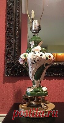 Antique Capodimonte Majolica Italian Pottery Lamp with Putti Metal Dolphin Base  | eBay There is no shade or bulb.