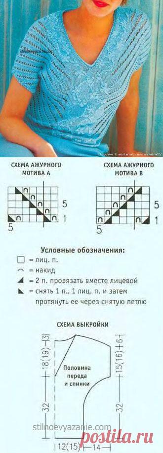 Пуловер с вышивкой и ажурными полосами.