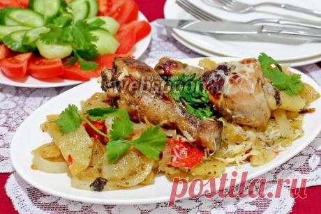 Куриные голени в маринаде, запечённые с овощами.