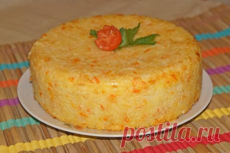 Рис, фаршированный мясом. Совершенно потрясающее, необыкновенно вкусное блюдо, очень сочное, никакой соус не требуется.

600 г мясного фарша, 6 ст. л. растительного масла (3+3), 1 крупная луковица, 2 зубчика чеснока, 1 ч. л. с верхом томатной пасты, 150 г твердого сыра, 1 яйцо, 100 мл сливок любой жирности, 2 стакана риса (1 стакан = 200 мл), 3,5 стакана овощного бульона или воды, 100 г моркови. 
НАЧИНКА: Лук измельчить или натереть на терке, чеснок очень мелко нарезать. О...