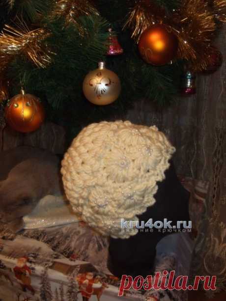 Теплая шапка крючком. Работа Марии Казановой