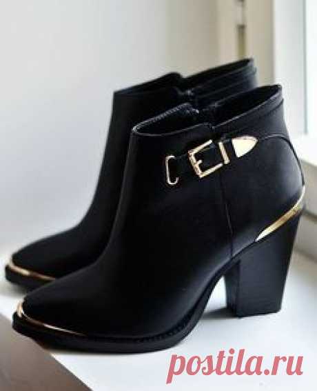 Black and gold leather boots from Steve Madden