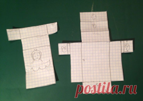 cut out pieces of paper with drawings on them